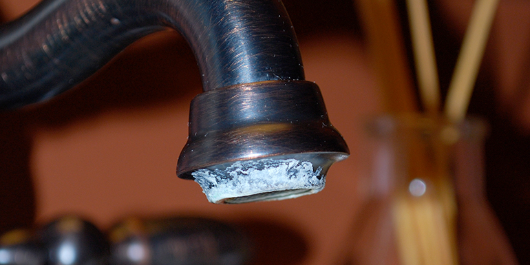 Remove Mineral Buildup on Faucets